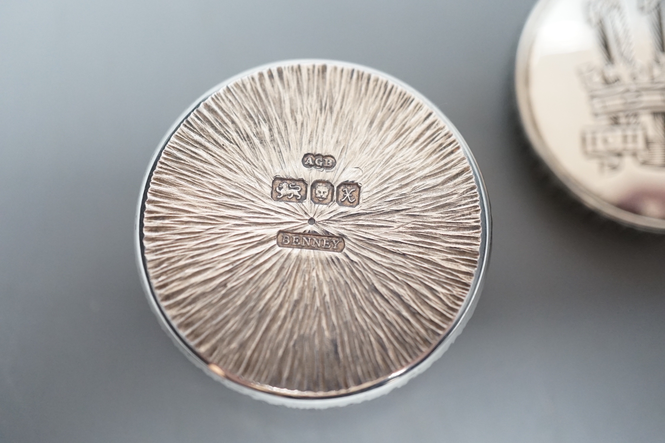 Adrian Gerald Benney- A modern textured silver pill box, engraved with the Prince of Wales feathers, London, 1997